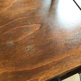 Worker on wooden compass feet