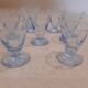 Lot de 7 petits verres à alcool en cristal très finement ciselé bleu.