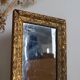 Antique mirror in gilded wood