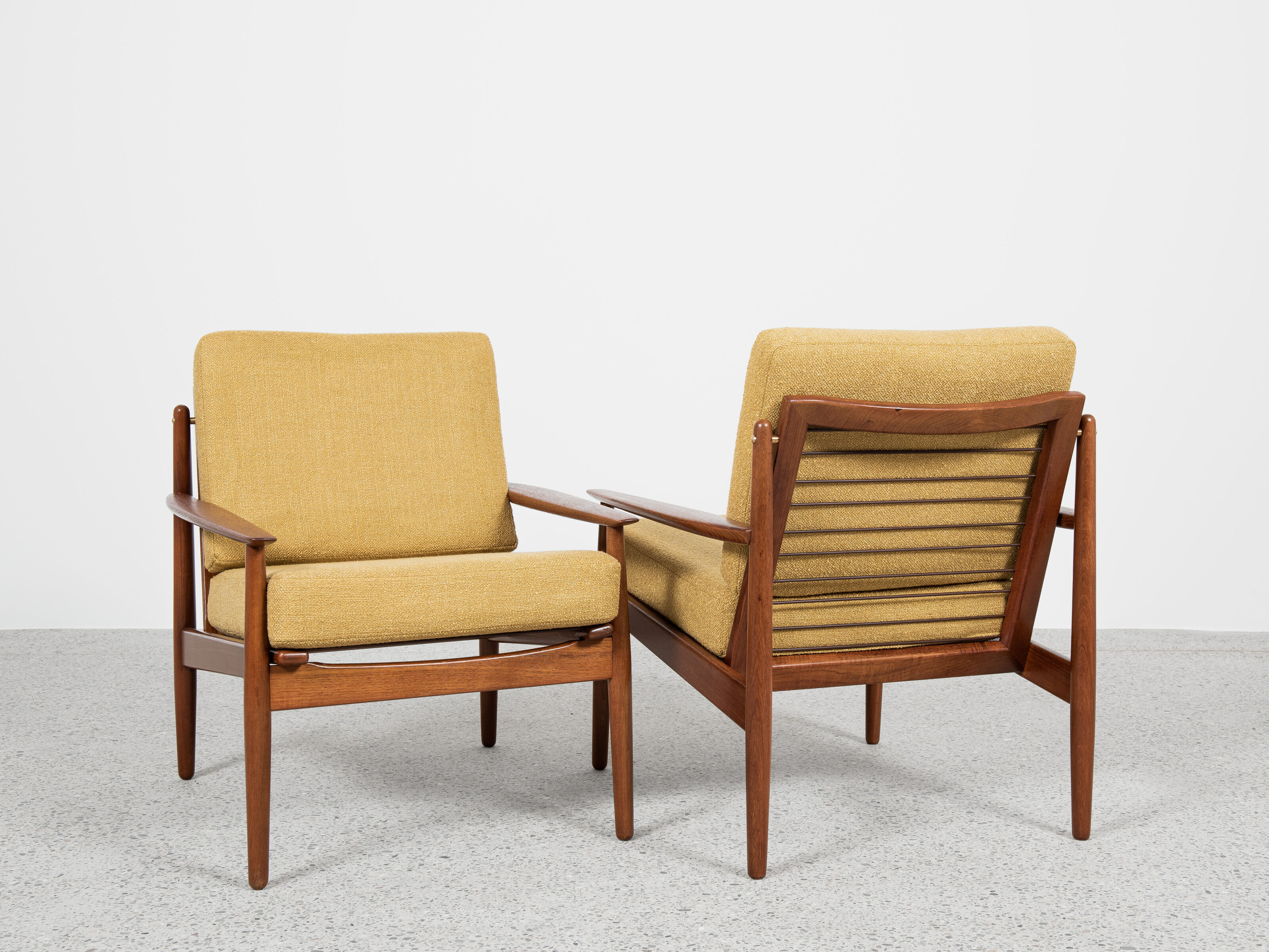 Midcentury Danish pair of easy chairs in teak by Arne Vodder for Glostrup