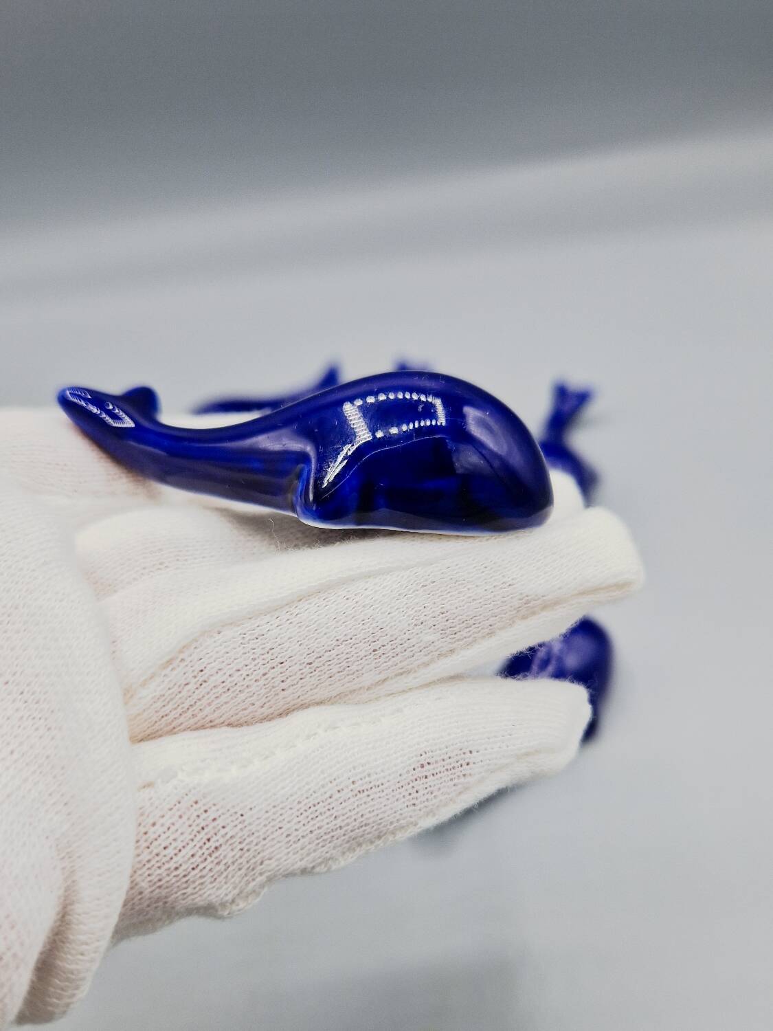 Set of 6 vintage blue porcelain whale knife rests.