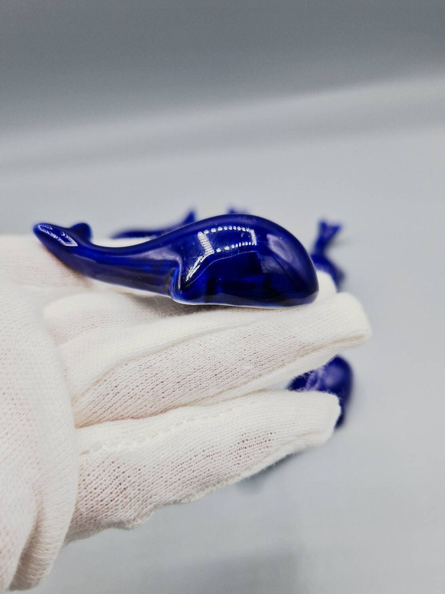 Set of 6 vintage blue porcelain whale knife rests.