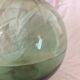 Demijohn old transparent green, estimated capacity around 12 to 15L