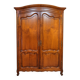 Linen cupboard in cherry wood in Louis XV style with two doors.