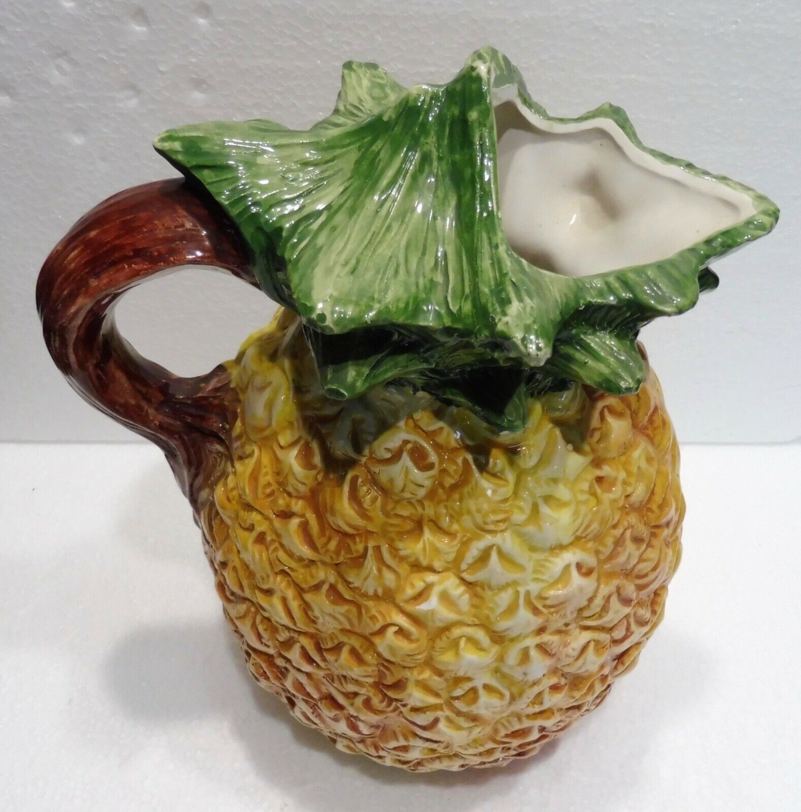 Pitcher on pineapple earthenware