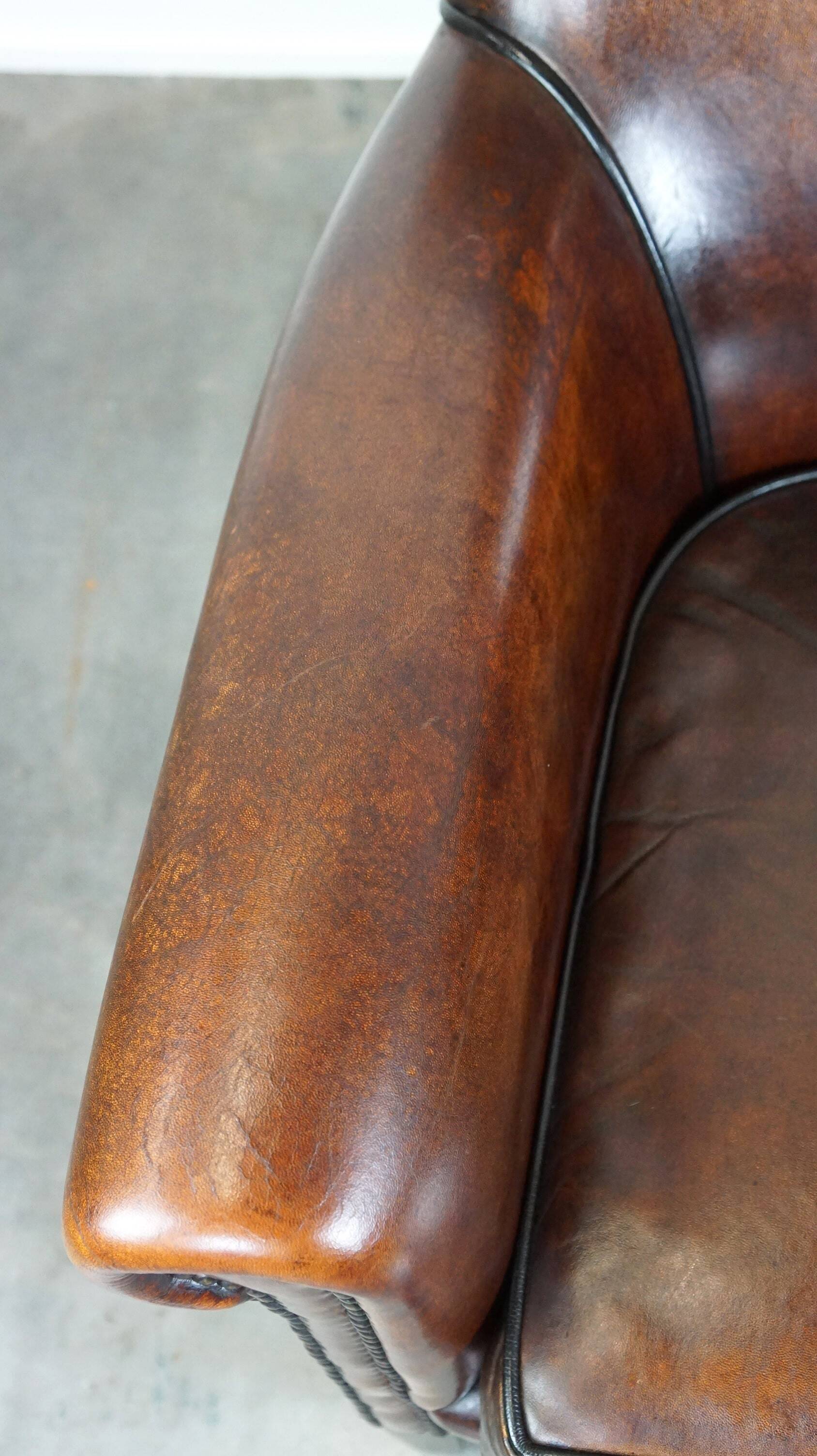 Stylish sheepskin leather armchair with a refined appearance