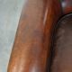 Stylish sheepskin leather armchair with a refined appearance