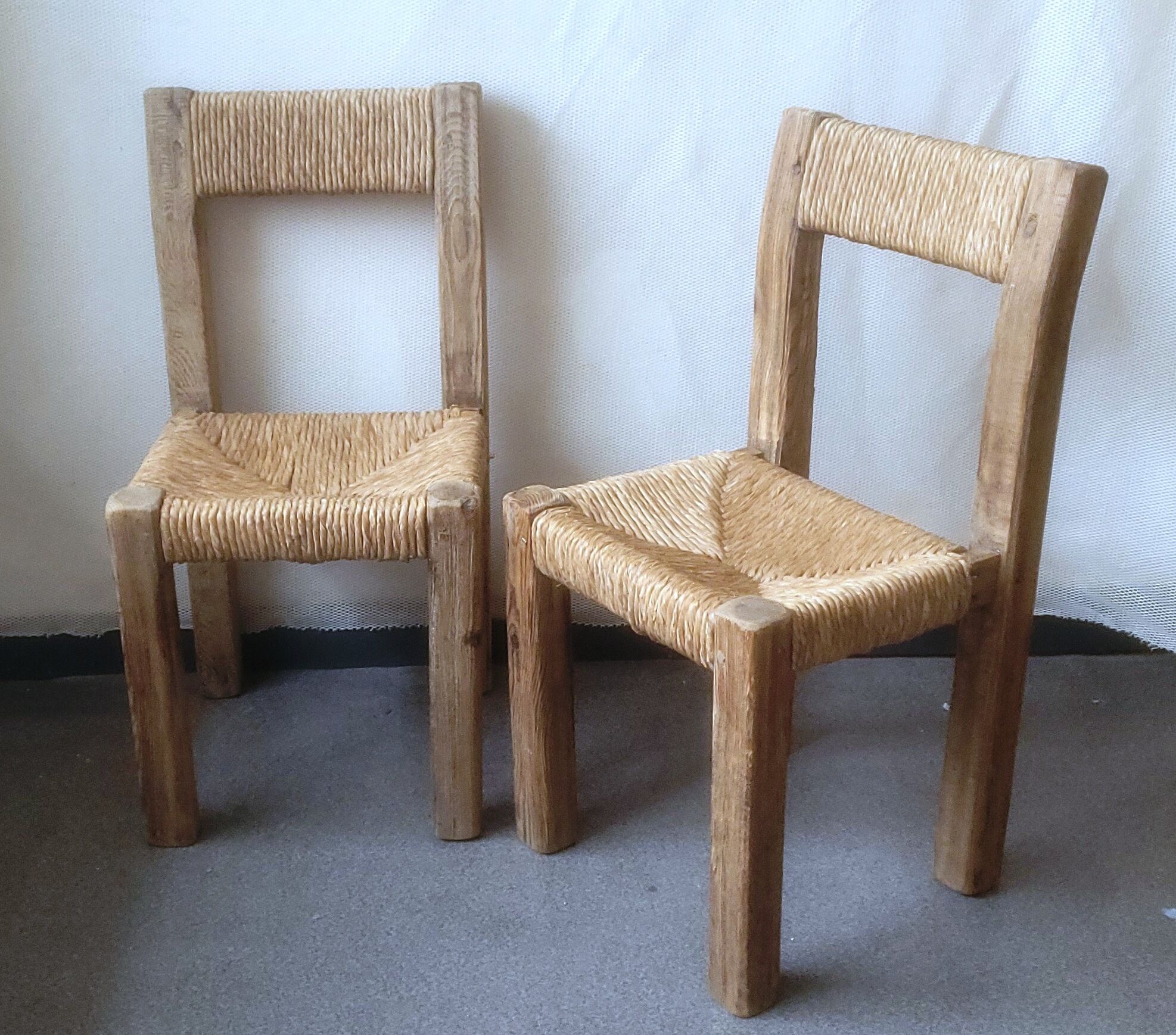 Pair of brutalist chairs in wood and straw