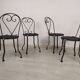 4 black garden chairs
