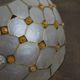 Suspension en nacre et perles orange