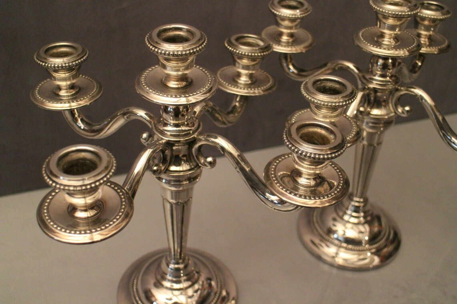 Pair of large candlesticks with 4 silver metal lights in Louis XVI style