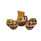 Amber glass and wicker lemonade service
