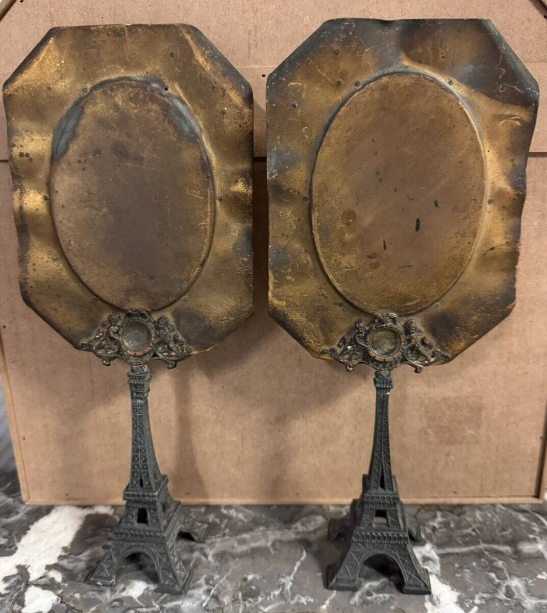 Pair of brass mirrors from the Art Deco period perched on the Eiffel Tower.