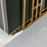 Brass laced library shelf by Kim Moltzer 1970