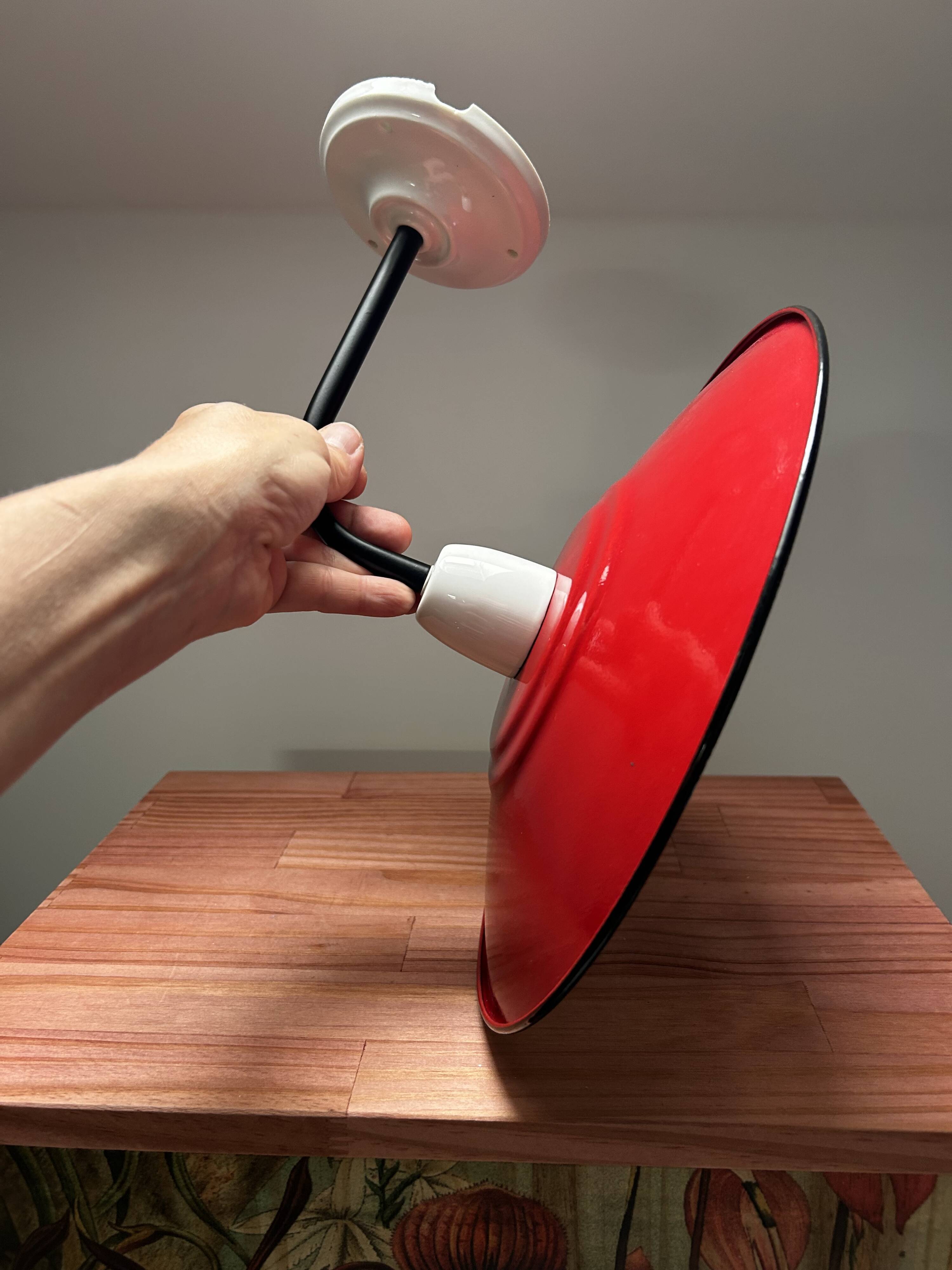 Red enamelled sheet metal wall light