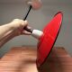 Red enamelled sheet metal wall light