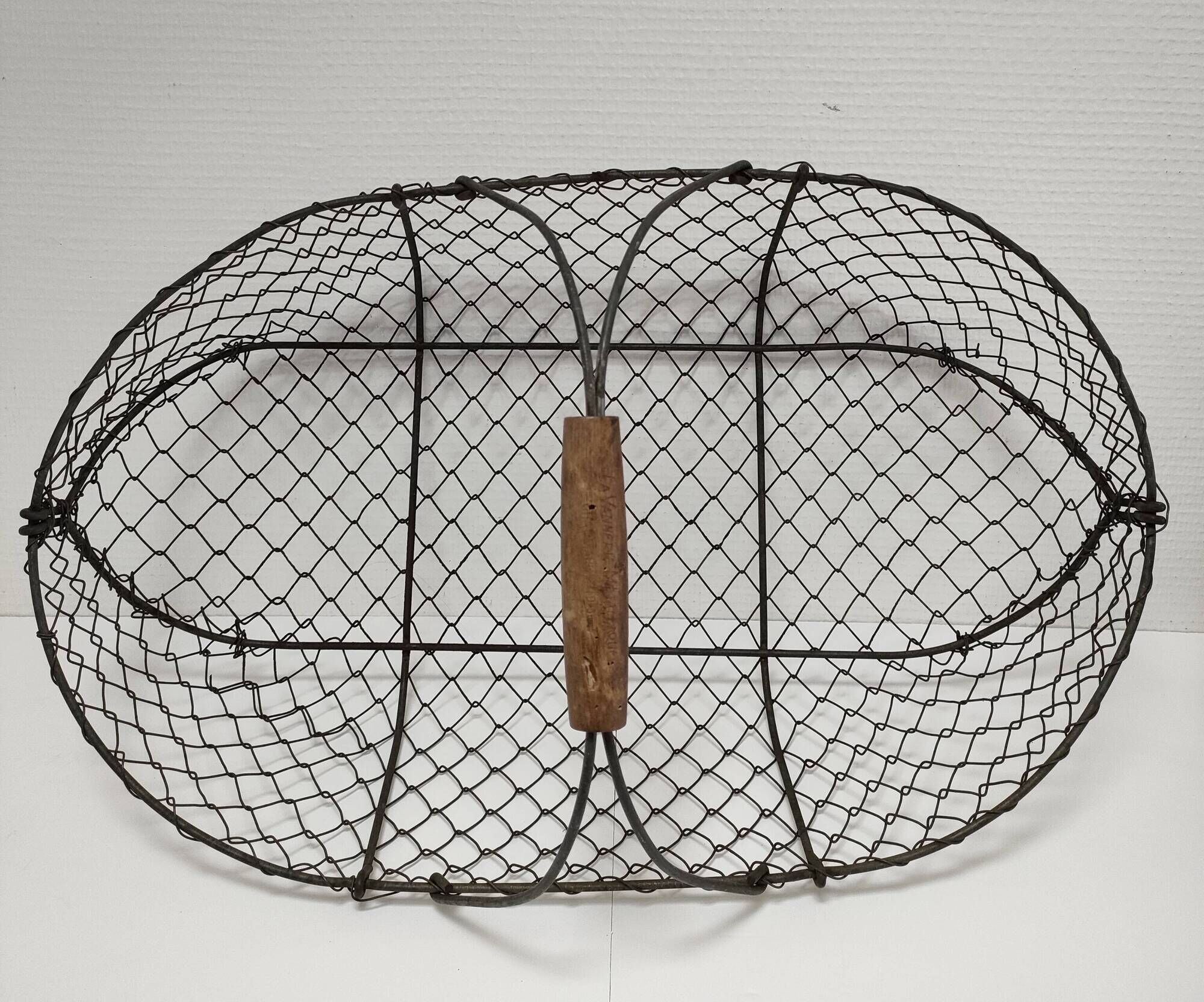 Two baskets metal and patinated wood early twentieth century