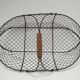 Two baskets metal and patinated wood early twentieth century