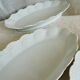 Service of 4 white porcelain dishes from Limoges Art Deco