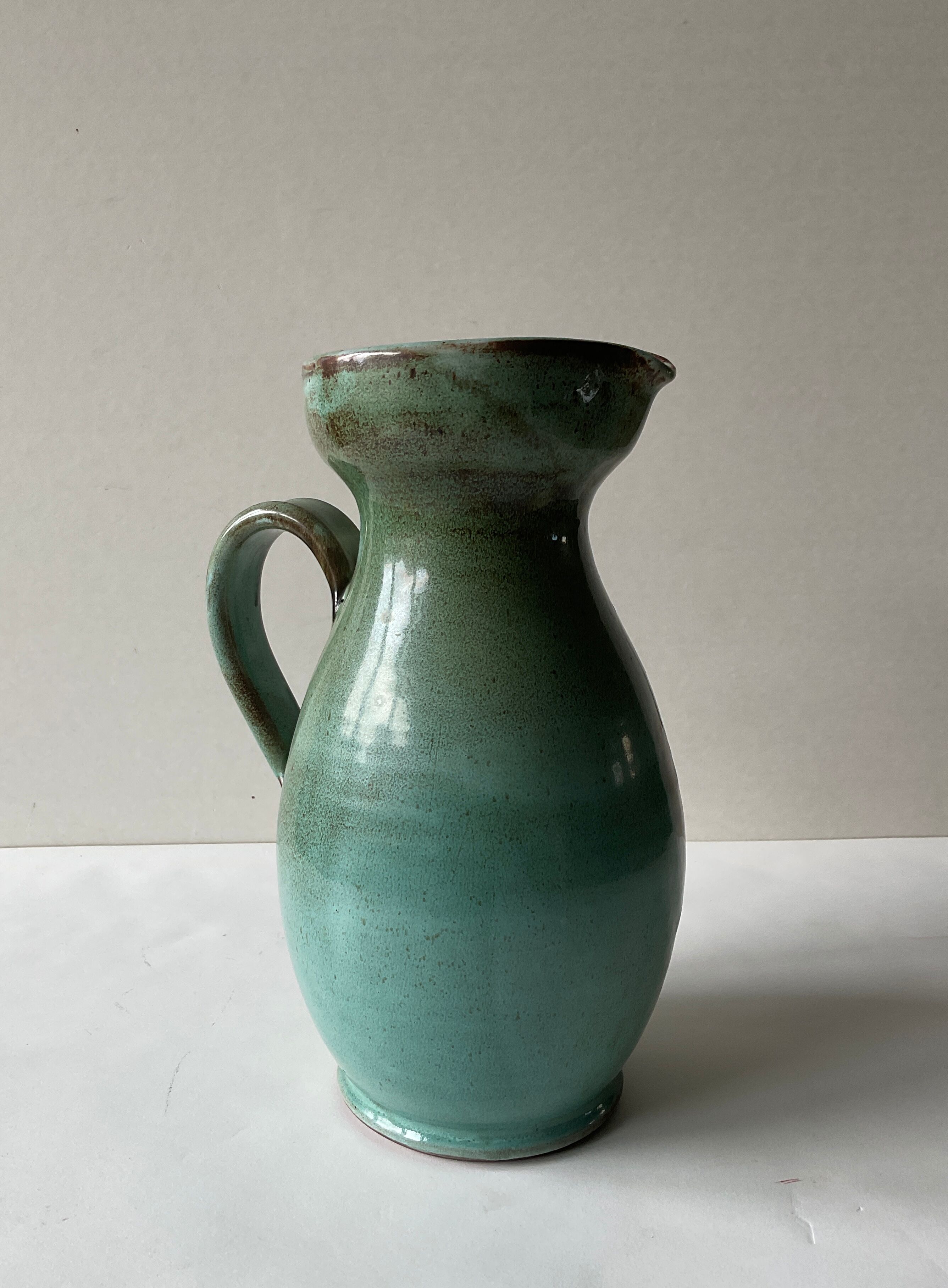 Vintage celadon ceramic pitcher