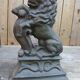 Paire de chenets lions en fonte