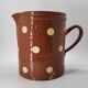 Old pitcher with polka dots savoyard pottery in glazed terracotta alsace