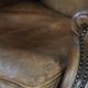 Warm, cosy and comfortable vintage sheepskin ear armchair with character