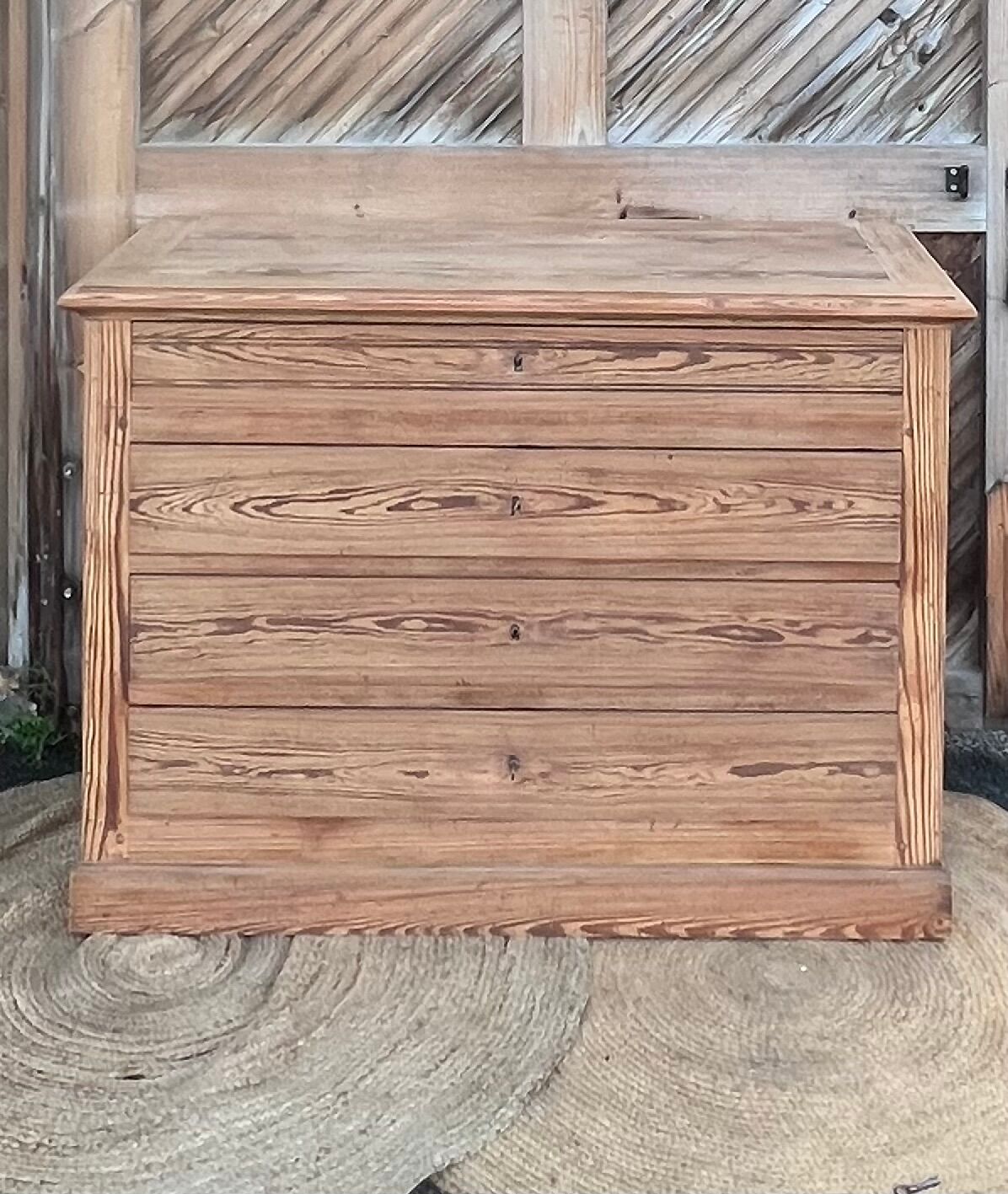 Large antique chest of drawers in raw solid wood.