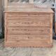 Large antique chest of drawers in raw solid wood.
