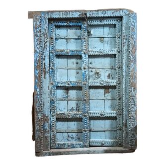 Old wooden door with frame