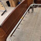 Brown lacquered wooden double bed frame in Mid-Century style from the 1940s.