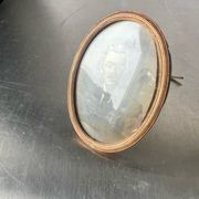 Metal gold colored oval picture frame brass