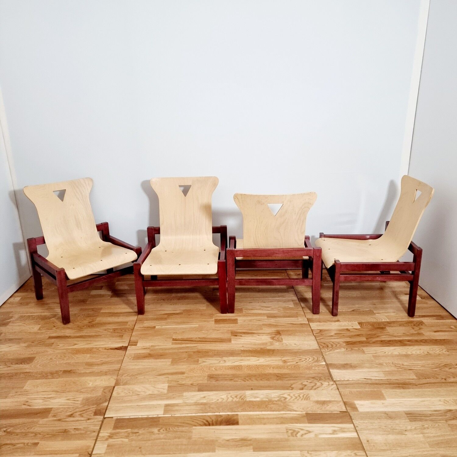 Suite of four heaters in purple stained wood and light oak, circa 1980