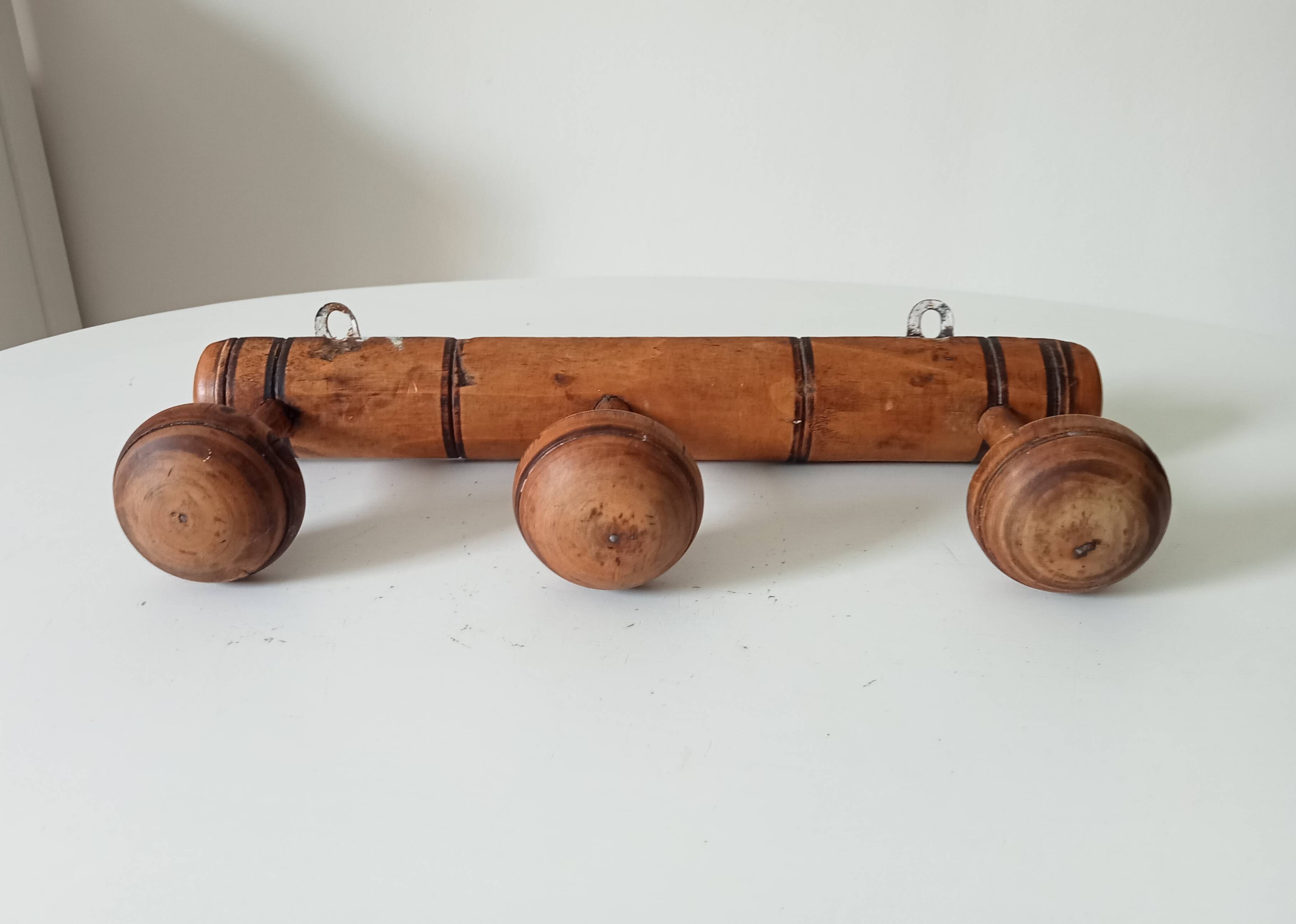 Antique folk art wall coat rack from the 50s