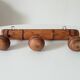 Antique folk art wall coat rack from the 50s
