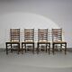 Ensemble de 4 chaises de salle à manger en chêne, rustiques, de ferme, à dossier en échelle avec sièges en jonc, années 1960