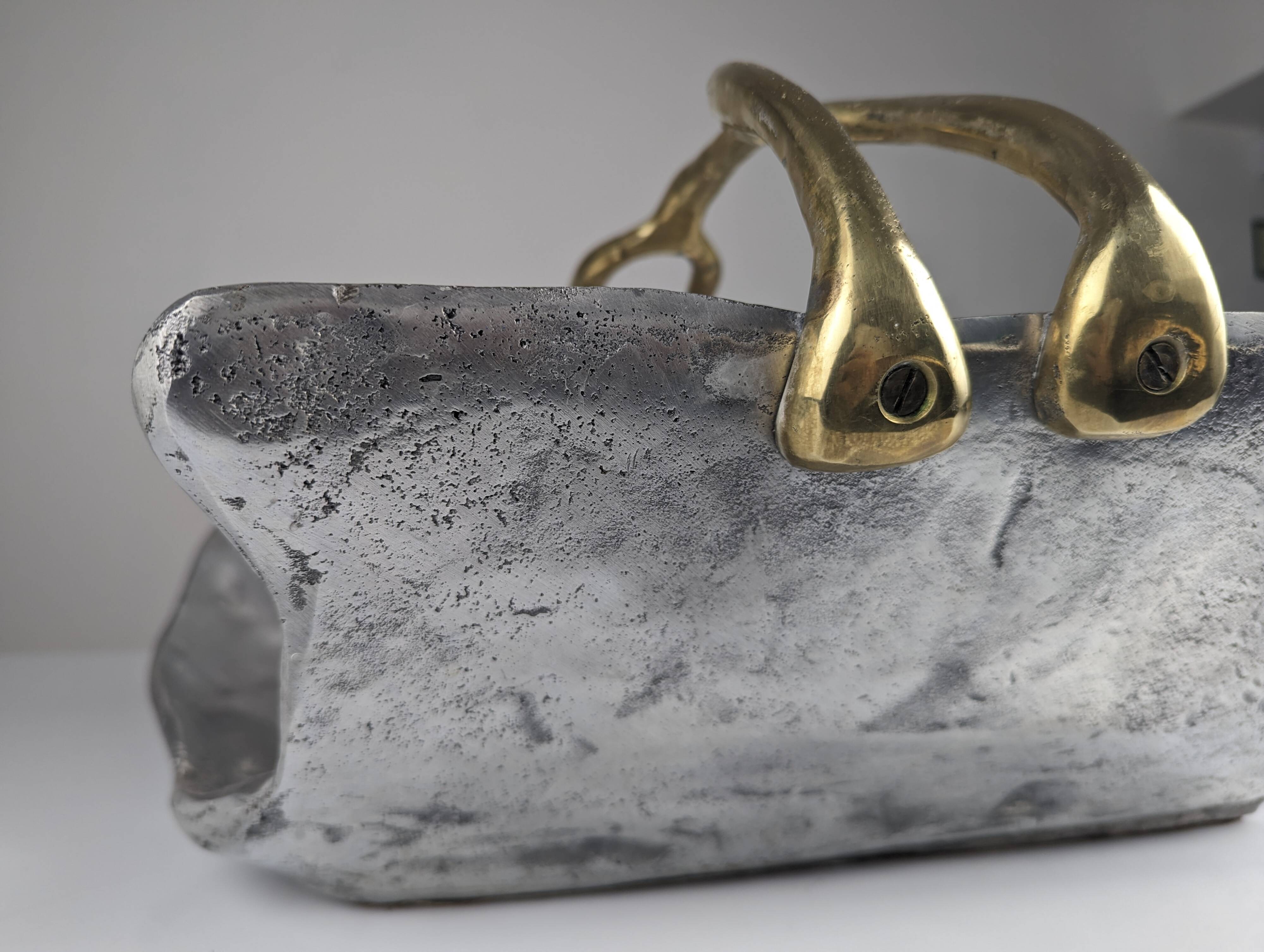 Firewood holder by David Marshall, 1980s