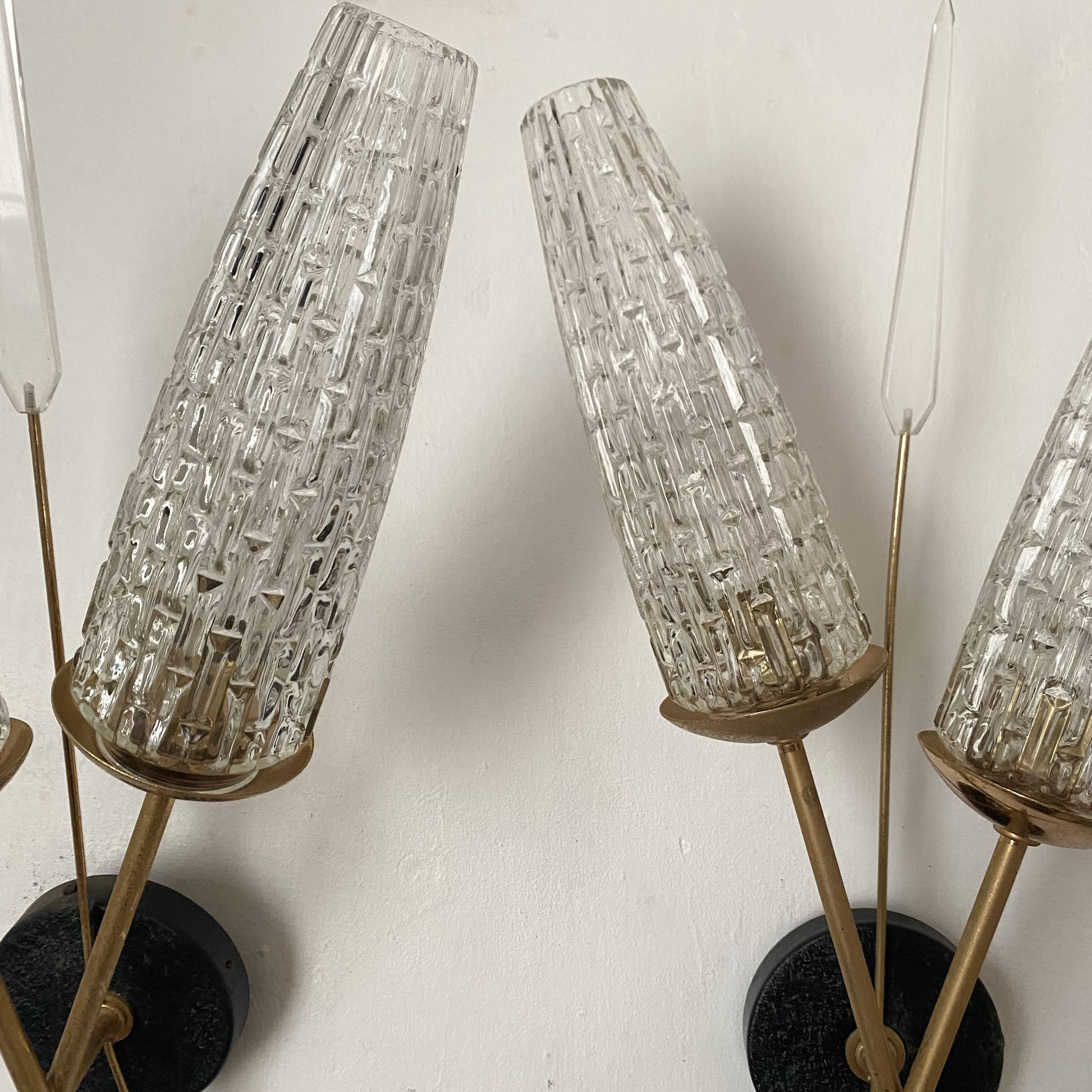 Pair of wall sconces from the 60s, gold metal and tulips.