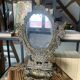 Psyche mirror in brass