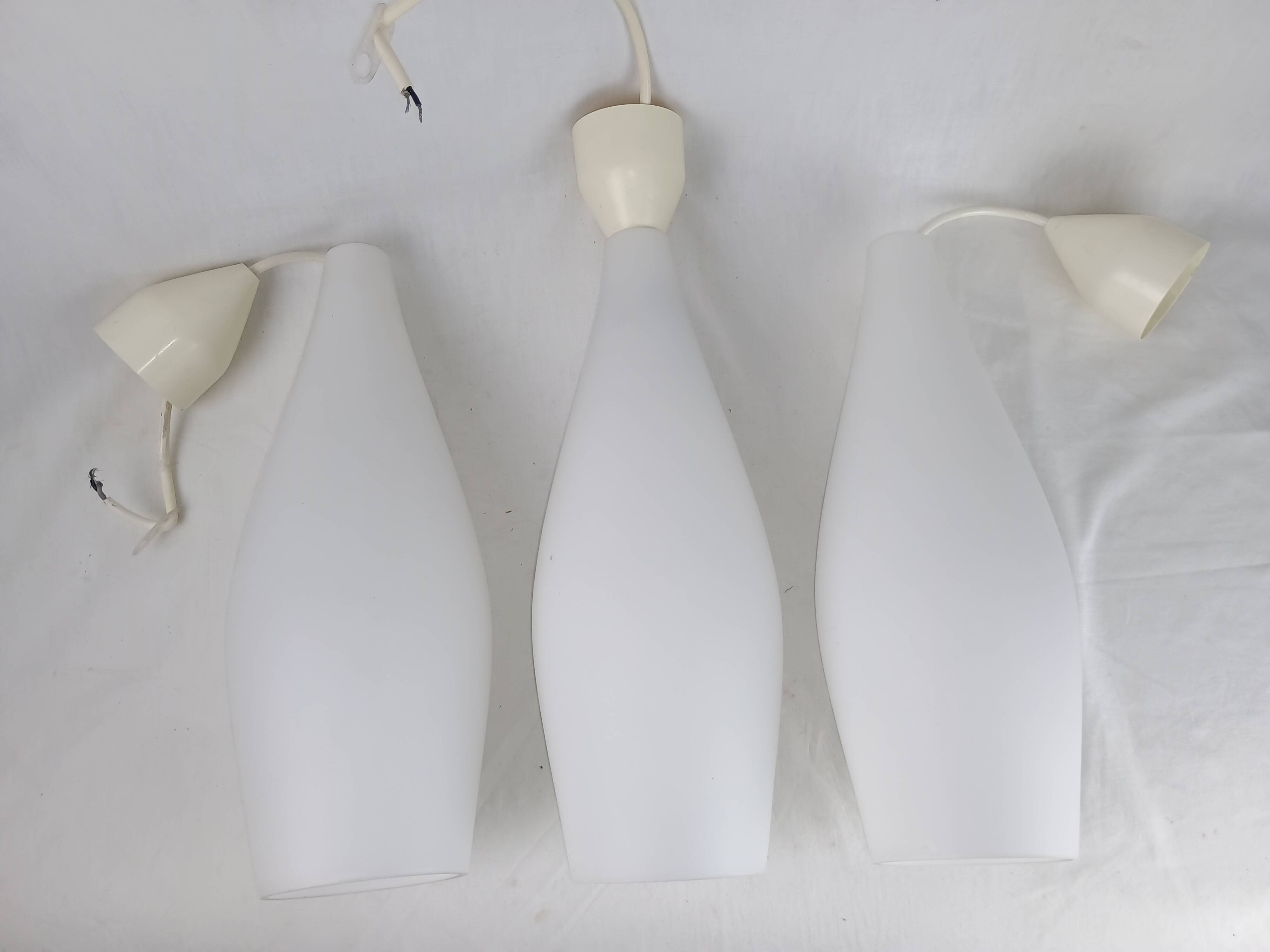 Superb set of three Holmegaard white opaline glass pendant lights