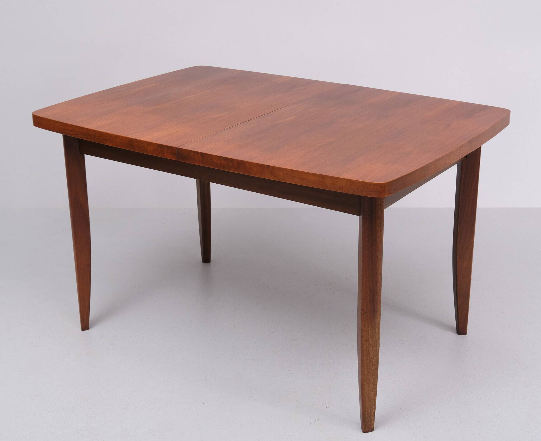 Extendable dining table in walnut wood by Jindrich Halabala 1960