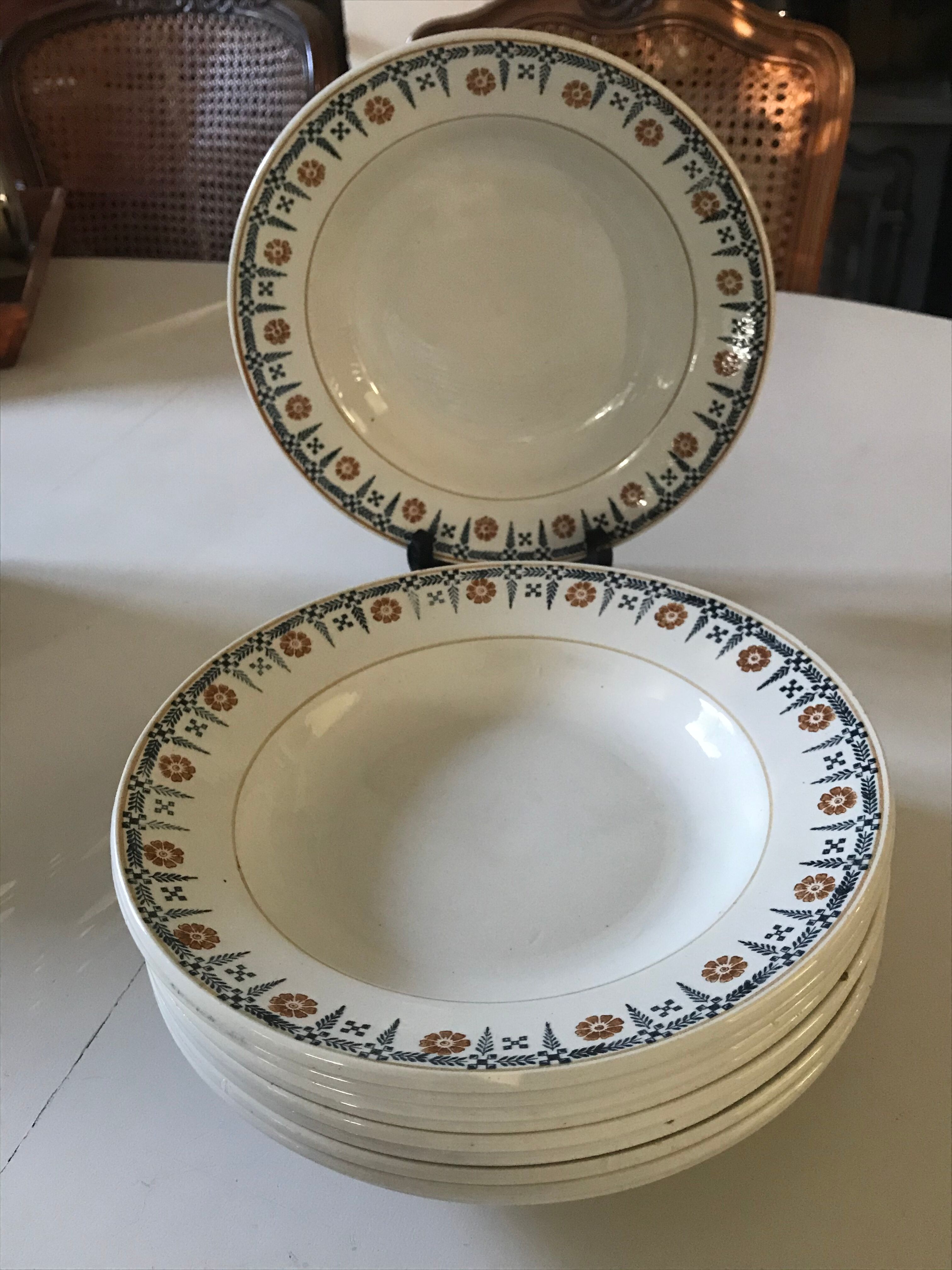 Set of 9 Saint Amand hollow plates