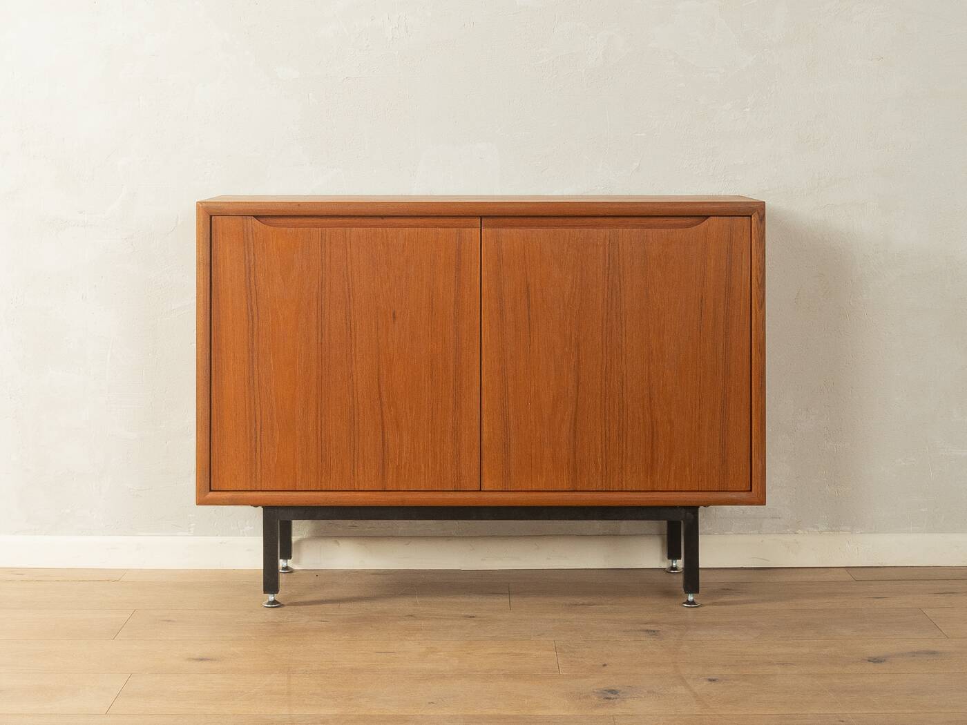 Classic chest of drawers from the 1960s with practical, closed storage space