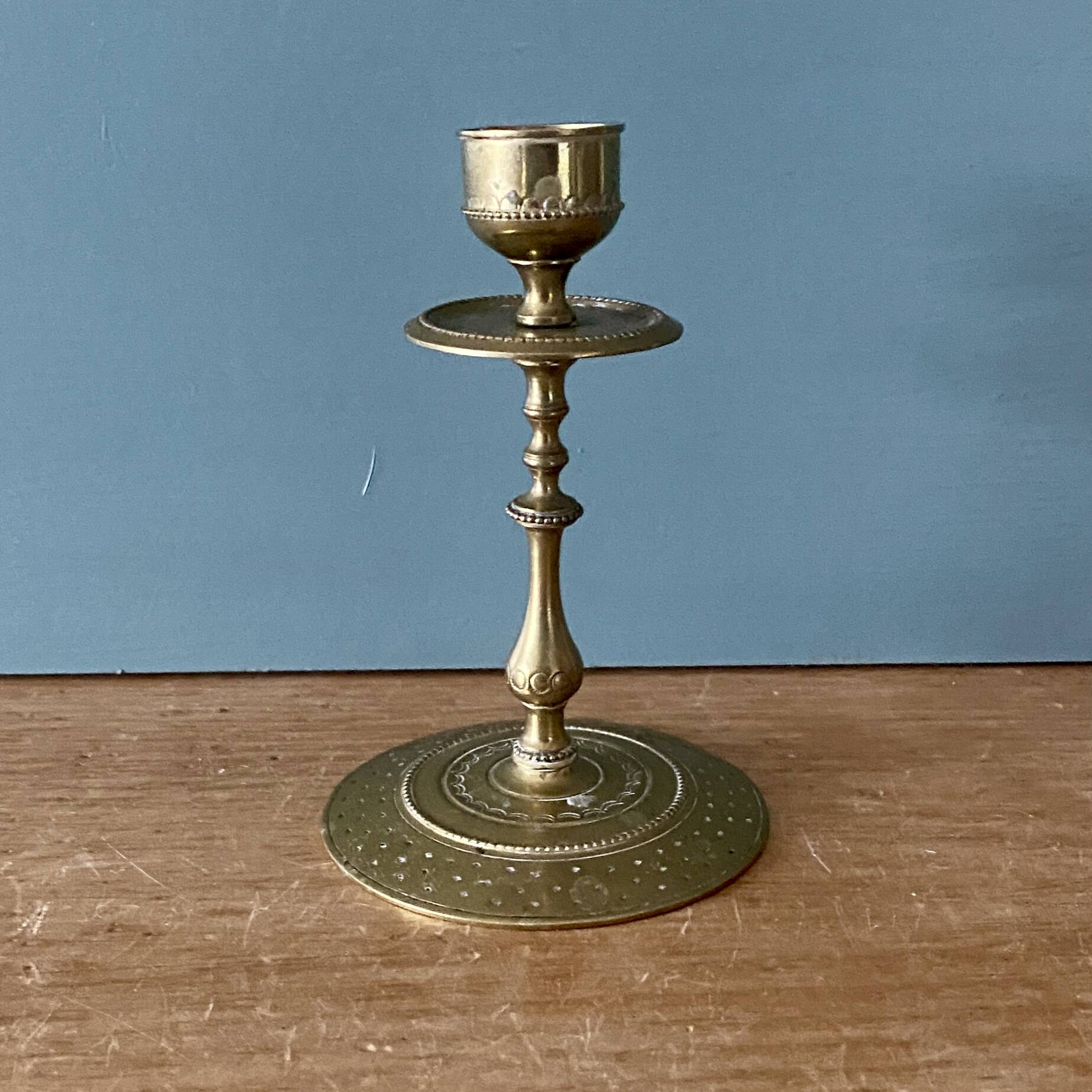 Antique brass candlestick holder