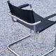 Fauteuil style MG5 tubes chromés assise et dossier cuir noir