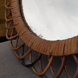 Vintage mirror in rattan flowers, sun