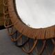 Vintage mirror in rattan flowers, sun