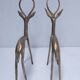 five vintage brass sculptures of gazelles, antelopes, and a giraffe