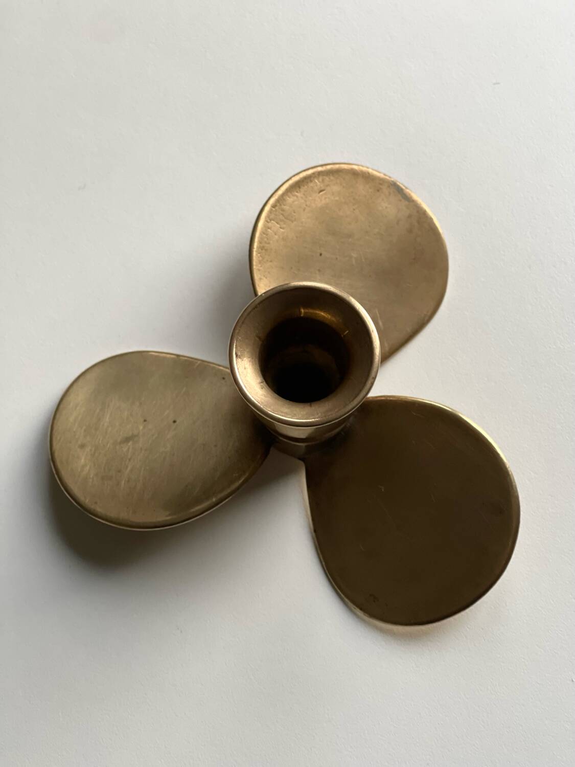 Propeller candle holder in solid brass