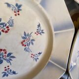 7 matching dessert plates in red green and blue.